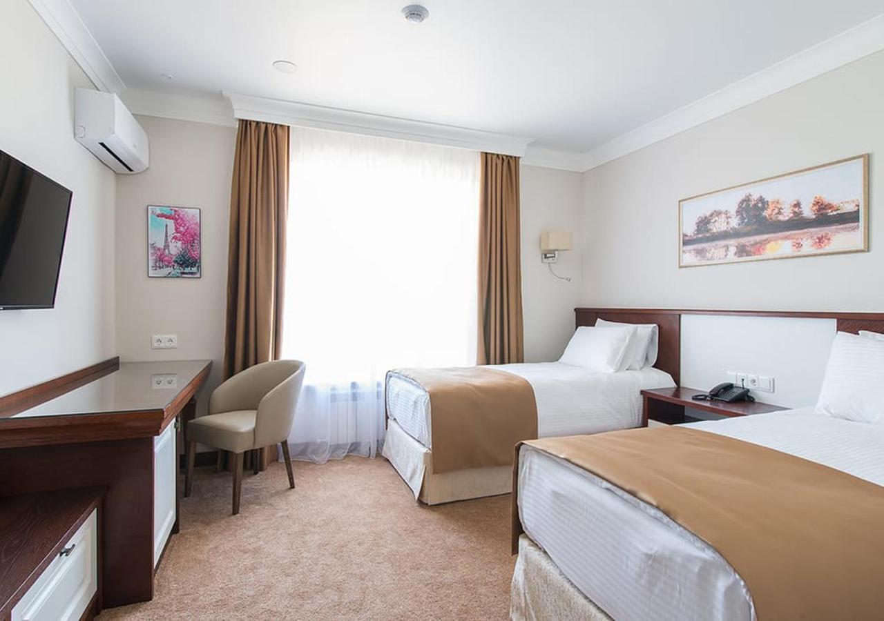 Boutique Hotel Kaspi Temirtau Bagian luar foto