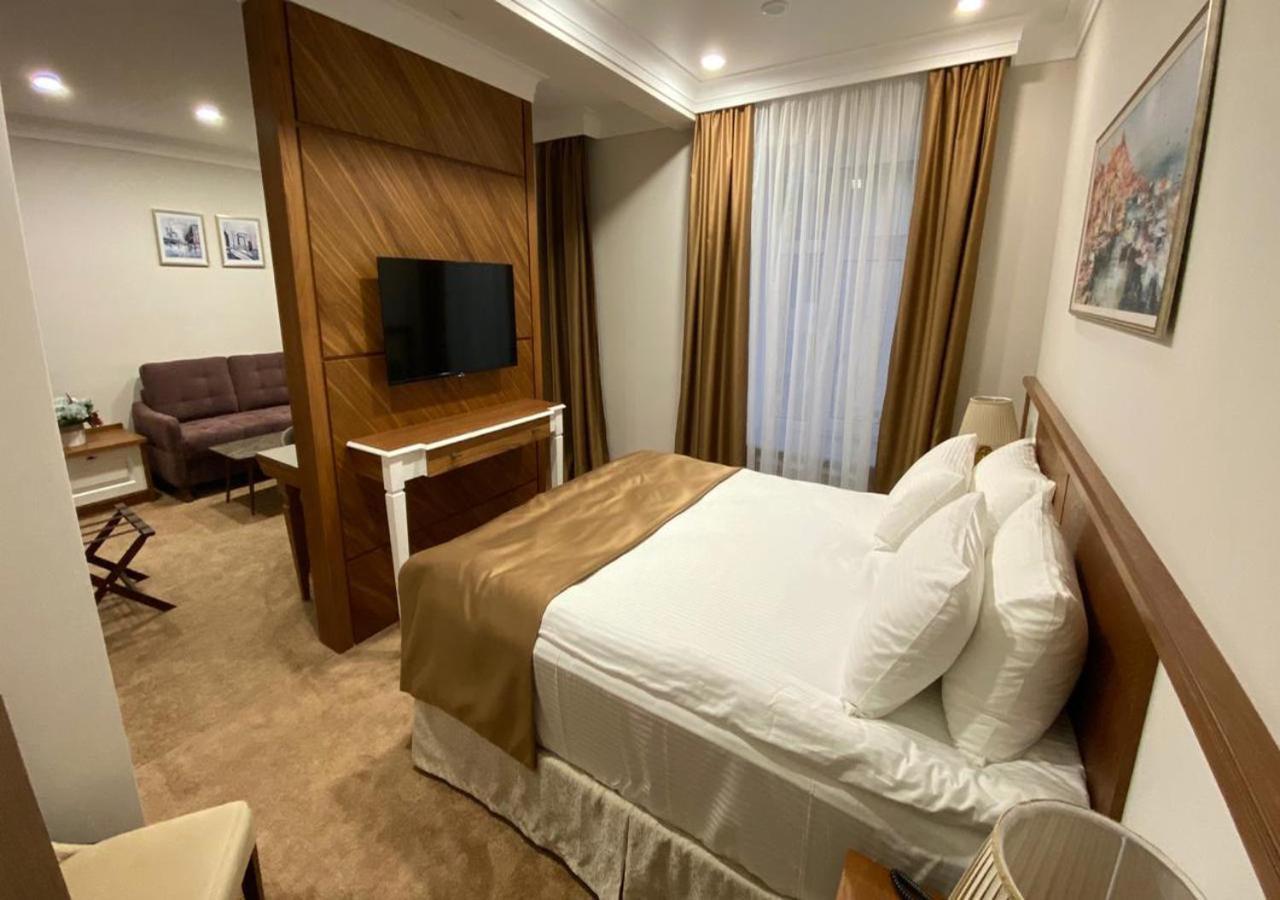 Boutique Hotel Kaspi Temirtau Bagian luar foto